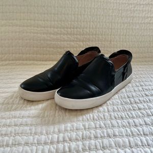 Kate Spade New York Lilly Women’s Black Leather Ruffle Slip-on Sneakers